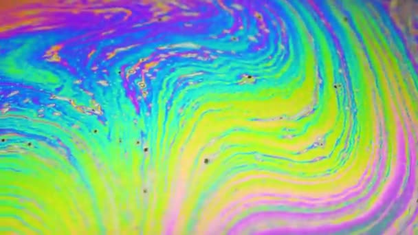 Amazing kleurrijke achtergrond vormde van de veelkleurige oppervlak van de beweging van de zeepbel — Stockvideo