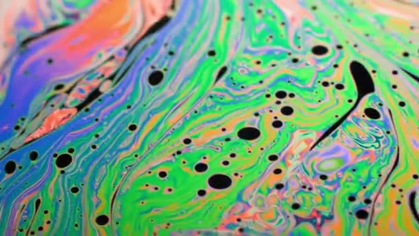 Prachtige structuur van kleurrijke bubbels. Chaotische beweging. — Stockvideo