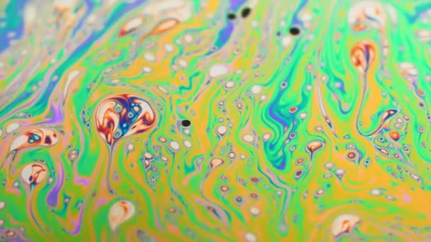 Macro shot of moving abstract surface of colorful bubble. — Stock Video