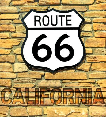 Amerika Birleşik Devletleri tarihi Route 66 yol iz California bir tuğla duvar. Kaliforniya'da Santa Monica şehir Chicago şehir Illinois'dan Amerikan karayolu.