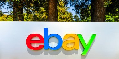 San Jose, California, USA - August 12, 2018: closeup of eBay logo at eBay's headquarters in San Jose, Silicon Valley, California. eBay Inc. is a multinational company, leader in e-commerce clipart