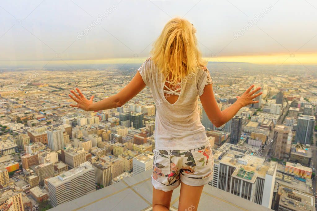 Woman looking Los Angeles Skyline