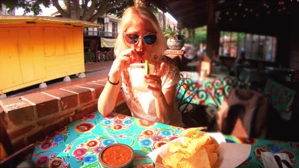 Tourist woman drinking Margarita — Stock Video