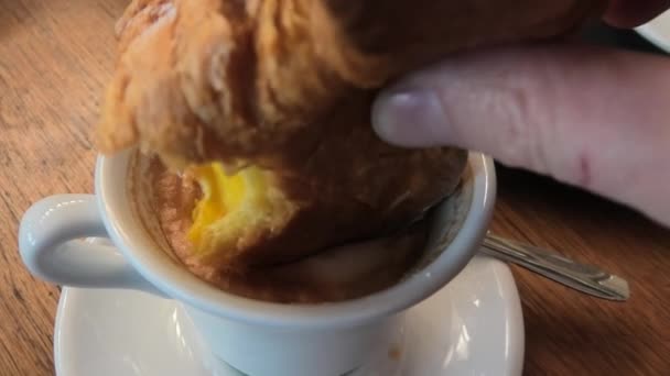 Pastry croissant and cappuccino — Stock Video