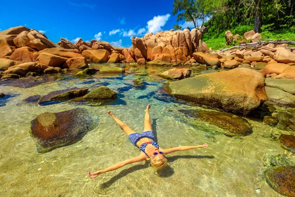 Woman at natural pool — 스톡 사진