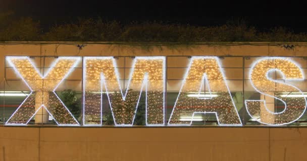 Luzes de Natal com texto XMAS — Vídeo de Stock