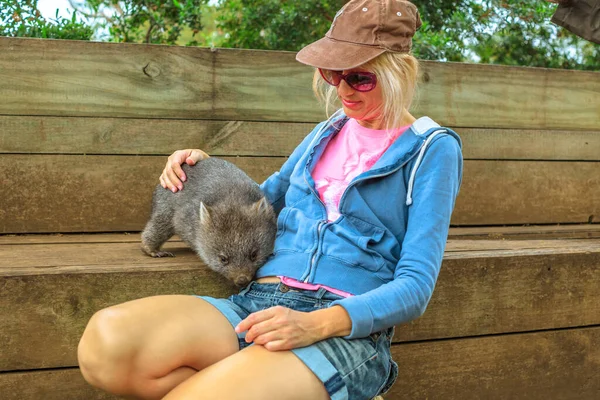 Woman with Wombat joey — Stock Photo, Image