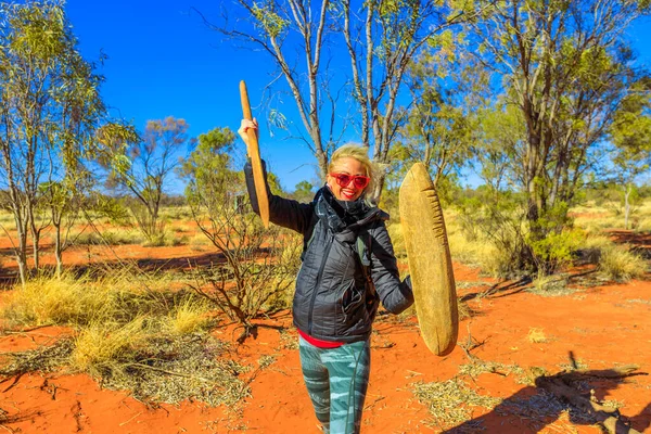 Woman with aboriginal weapons — Stock Photo, Image