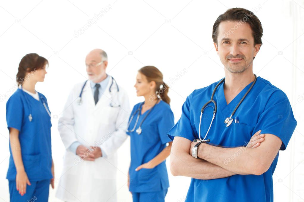 Group of doctors isolated on white background, studio shot