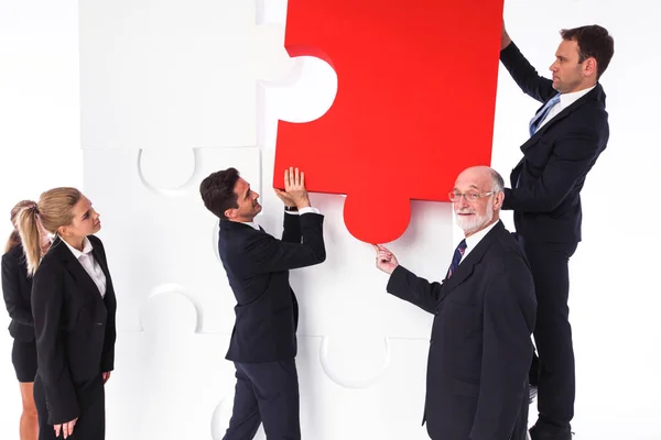 Equipo Negocios Montando Gran Rompecabezas Aislado Sobre Fondo Blanco —  Fotos de Stock