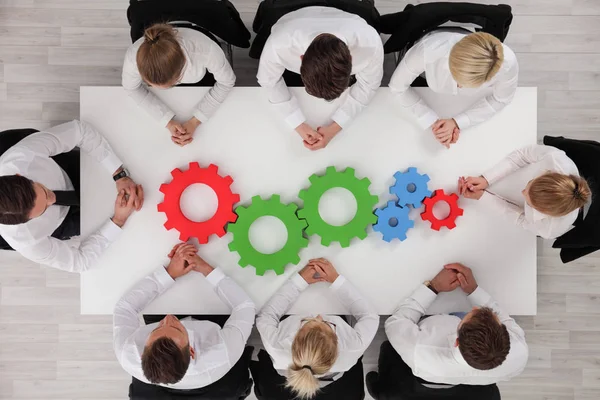 Imagen Conceptual Del Trabajo Cohesionado Engranajes Coloridos Sobre Mesa Interacción — Foto de Stock