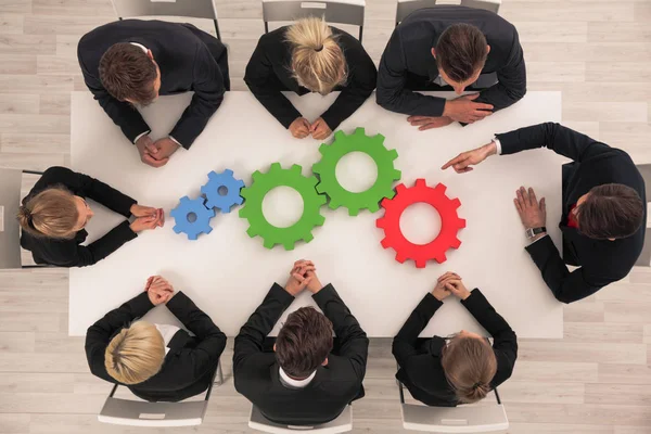 Imagen Conceptual Del Trabajo Cohesionado Engranajes Coloridos Sobre Mesa Interacción —  Fotos de Stock