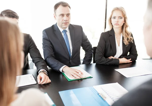 Business people discussing financial reports — Stock Photo, Image