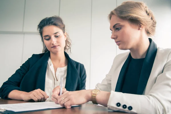 Business women Signing Contract