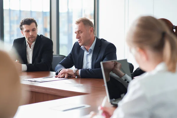 Business partners discussing documents — Stock Photo, Image