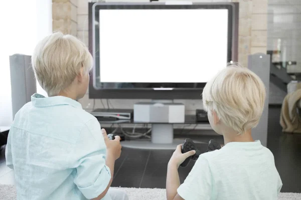 Crianças jogando videogames — Fotografia de Stock