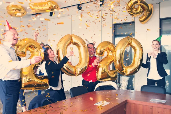 Business people celebrating New Year — Stock Photo, Image