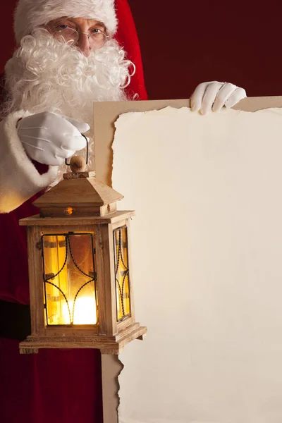 Papai Noel com lanterna — Fotografia de Stock