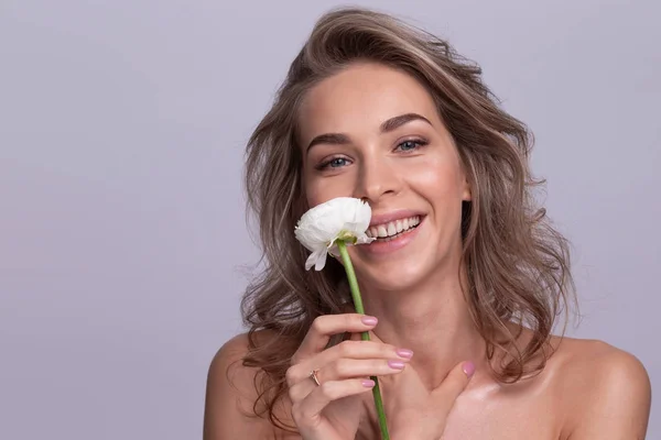 Blonde woman with white rose — Stock Photo, Image