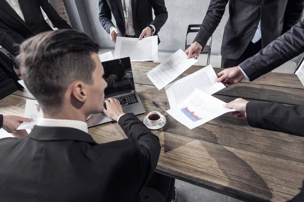 Business man getting extra work — Stock Photo, Image