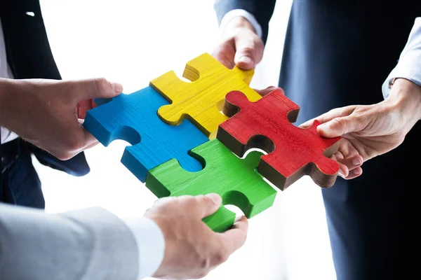 Business People Team Assembling Four Color Jigsaw Puzzle Pieces Unity — Stock Photo, Image
