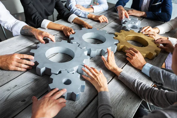 Group Business People Joining Together Silver Golden Colored Gears Table — Stock Photo, Image