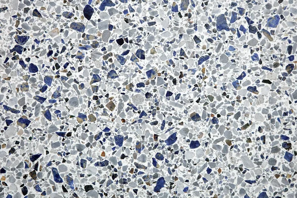 Doku ve küçük çakıl taşları ile renkli boyalar. Eski mavi ve gri çimento duvar doku grunge arka plan.