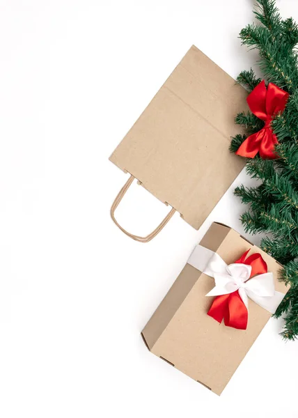Gifts, Bags, Christmas tree and Packing boxes on the white background, top view, delivery concept.