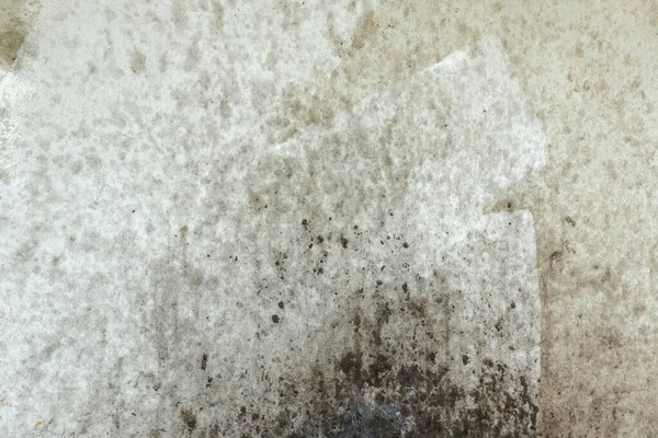 Oil stains in the kitchen from cooking splashed onto the cement wall.Oil stains on the walls,dirt stains on kitchen wall,Dirty Cooking,oil splatters from cooking.