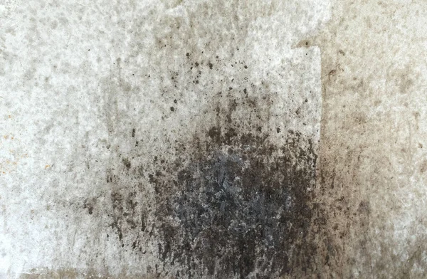 Oil stains in the kitchen from cooking splashed onto the cement wall.Oil stains on the walls,dirt stains on kitchen wall,Dirty Cooking,oil splatters from cooking.
