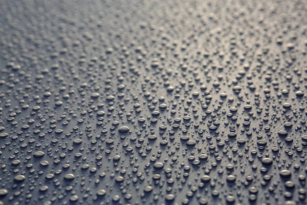 在遮阳篷上的水的纹理 在黑海上的夏季大雨后 — 图库照片