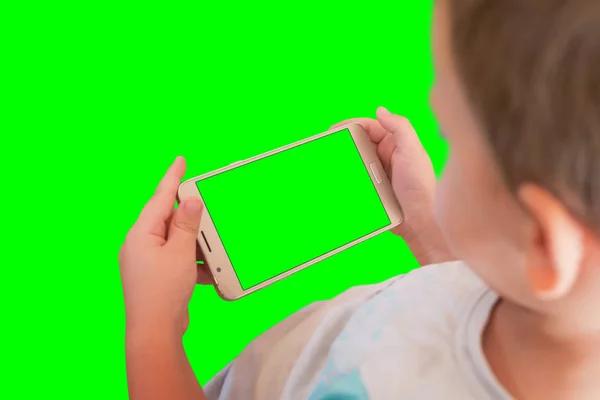 Kid Ser Video Eller Spiller Spill Smarttelefon Forhøyet Skjerm Bakgrunn – stockfoto