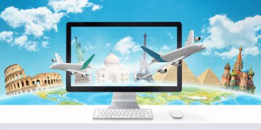 Bir bilgisayar ekranı, uçaklar ve arka planda ünlü dünya manzaraları ile tatil ve bilet online kavramı rezervasyon.