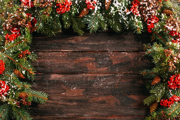 Christmas Fir Tree on a Rustic Wooden Background