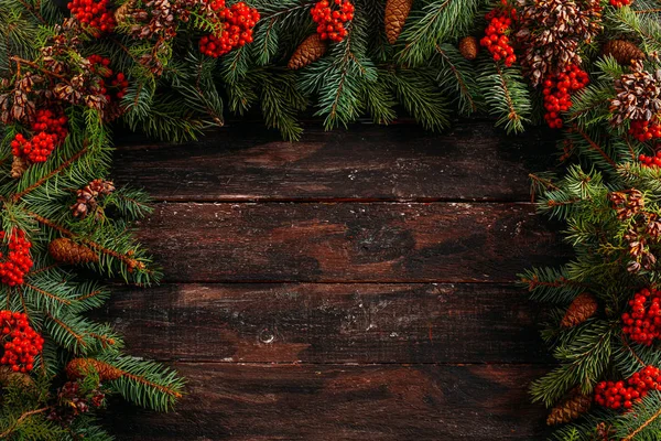 Christmas Fir Tree on a Rustic Wooden Background