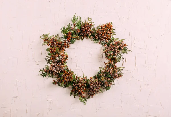 Homemade Christmas Wreath on White Background