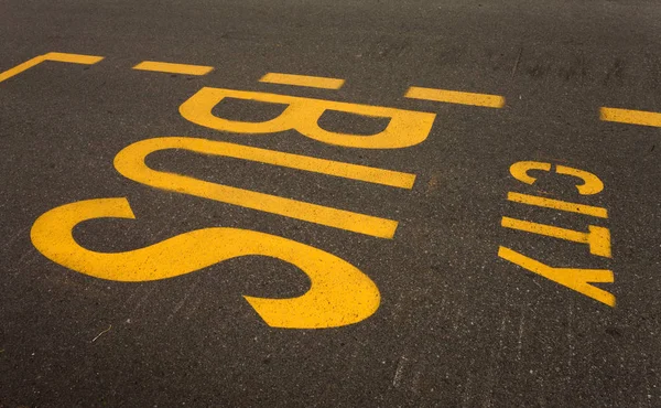 yellow city bus fast lane