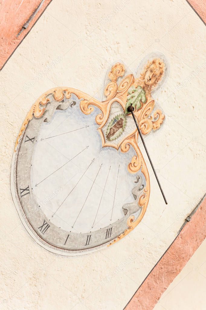 A detail of the old sundial painted on  the external wall of the little chapel of St. Johan in Val di Funes
