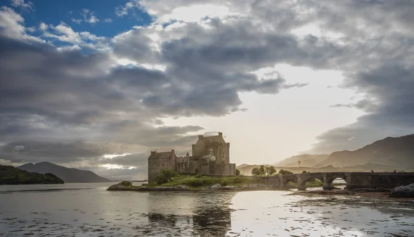 Eilean Donan Castle with cloudy sunset sky  Highlands Scotland Landscape Travel Great Britan