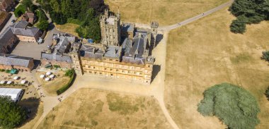 Drone Aerial photography of Highclere castle famous as downton abbey and park England clipart