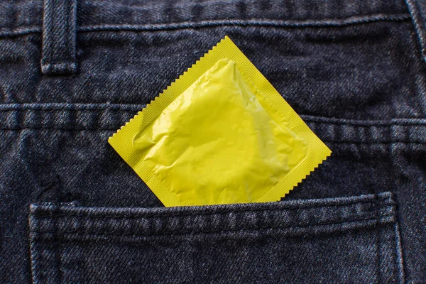 Condom Black Jeans Pocket World Aids Day Concept — стоковое фото