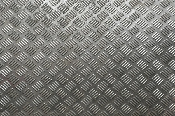 black metal background and texture. diamond plate.