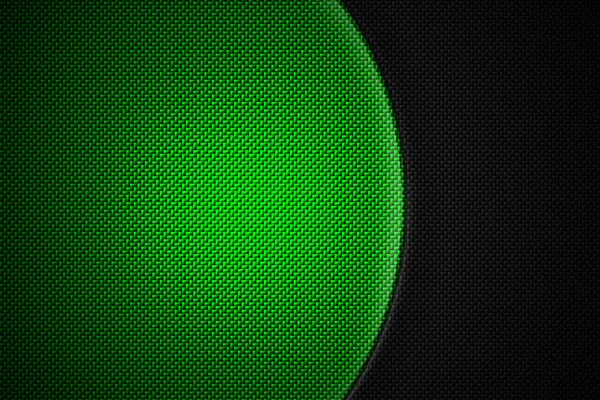 green and black carbon fiber. two tone metal background and text
