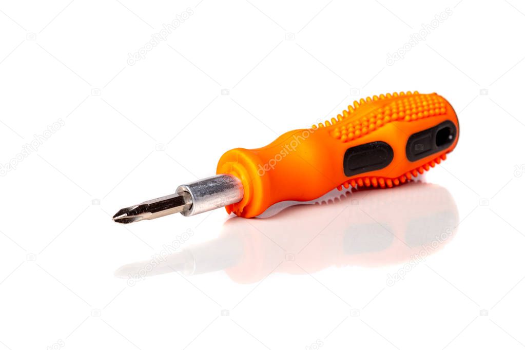 A set of different attachments for a head screwdriver with a screwdriver on a white background close-up