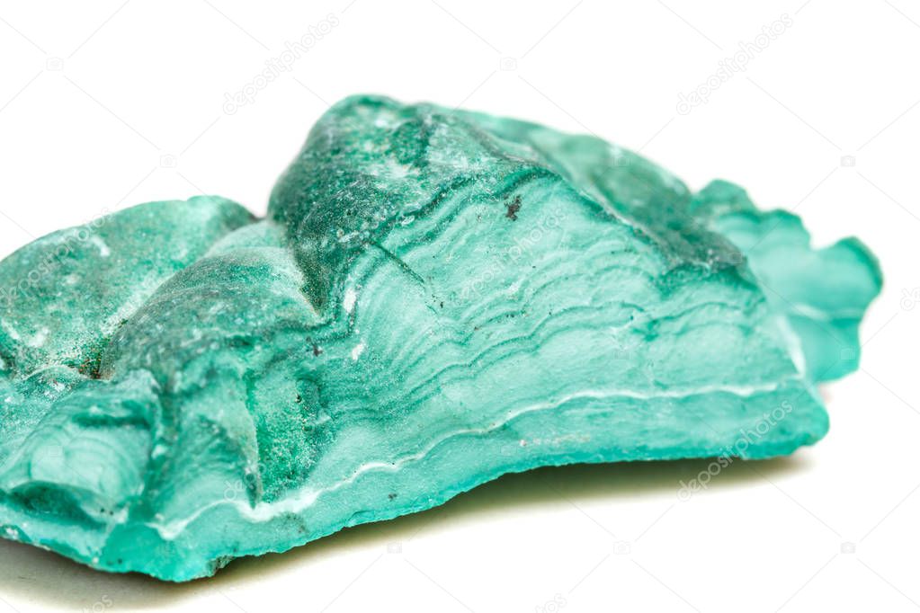Macro mineral stone Malachite in the rock on a white background close up