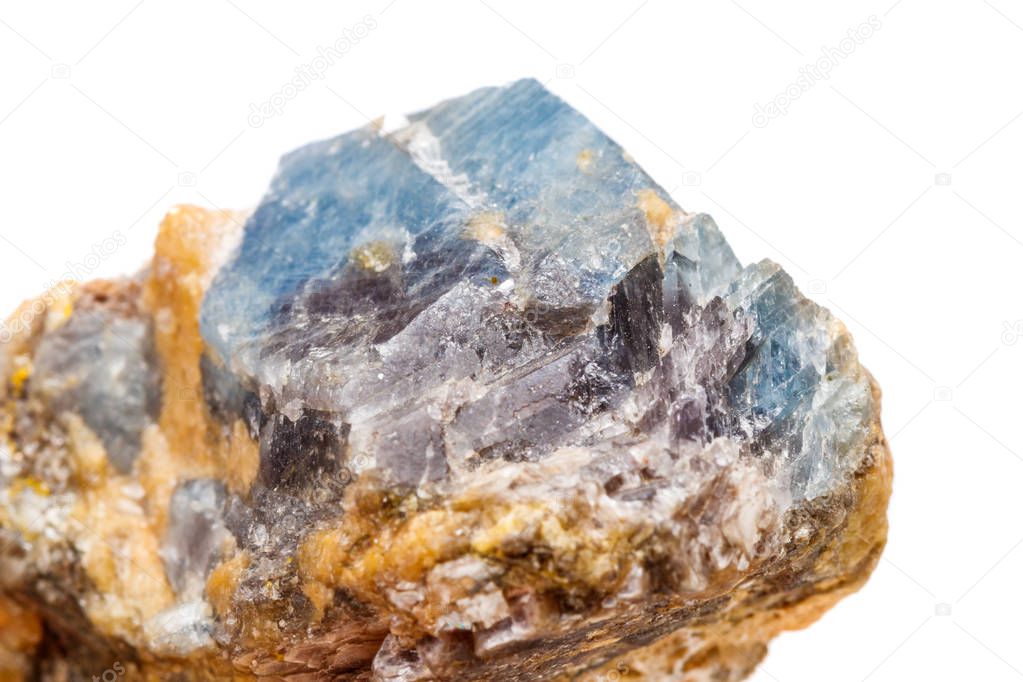 Macro mineral stone Corundum in rock a white background close up