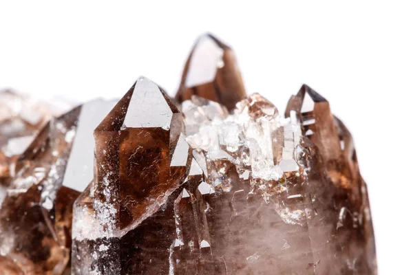 Macro mineral stone Morion crystal in the rock a white background close up