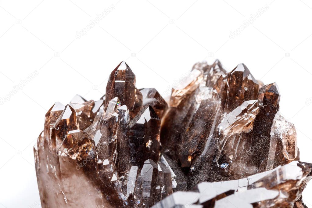 Macro mineral stone Morion crystal in the rock a white background close up