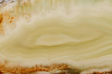 Makro mineral taş Sarı Akik doğurmak beyaz bir arka plan yakın çekim