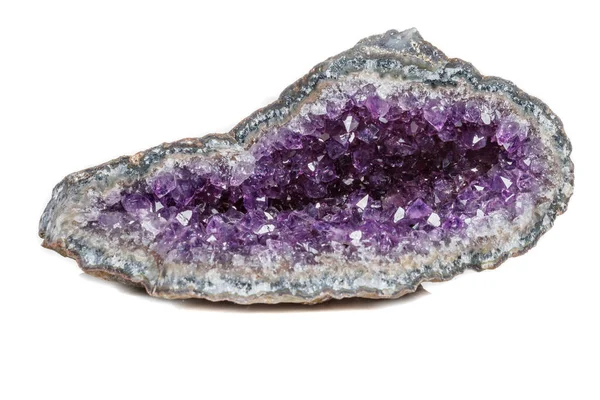 Makro Mineral taş fırçalanabilir beyaz bir arka plan üzerinde Rock'daki yakın çekim